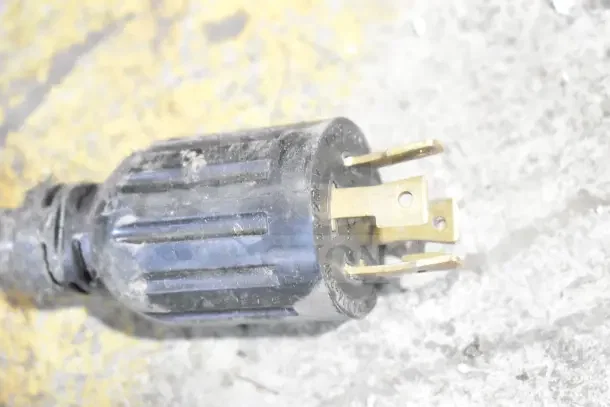 Close-up of a power plug for the Solwave 180MW1200T Commercial Microwave Oven, showing electrical prongs.