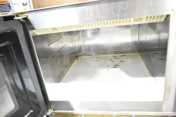 2018 Solwave 180MW1200T commercial microwave oven, interior view. Signs of wear, 120 volts, 1 phase, used condition.