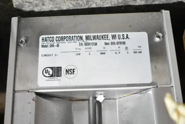 Hatco GRA-48 Glo-Ray Infrared Food Warmer label showing model, voltage, and NSF certification.