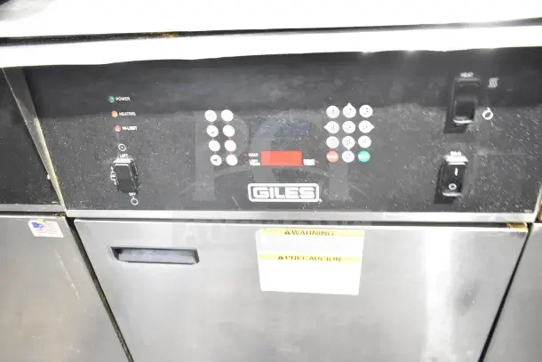 Giles EOF-24 Stainless Steel 3 Bay Electric Fryer with Display Panel, Giles Logo, and Warning Label, on Casters.