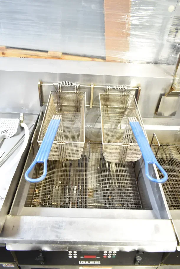 Giles EOF-24 stainless steel 3-bay commercial fryer with dumping station, electric, 480V, 3-phase, on casters.