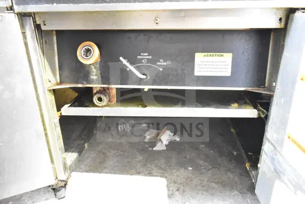 Giles EOF-24 commercial 3 bay fryer with EOF-BIB dumping station, stainless steel, on casters, 480V 3-phase. Used condition.