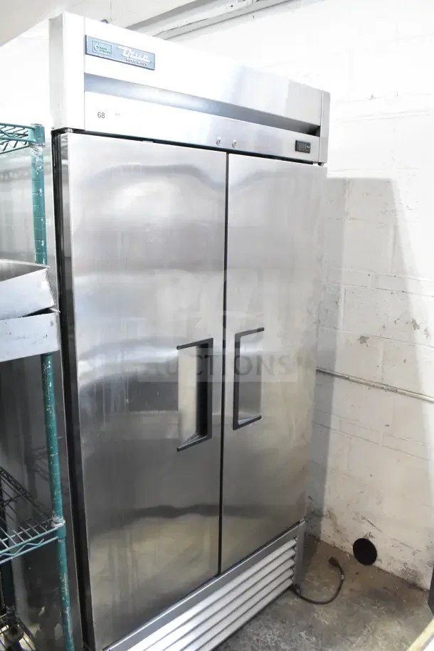 True Commercial 2 Door Reach In Cooler, stainless steel, 115 volts, 1 phase, by True, in good condition.