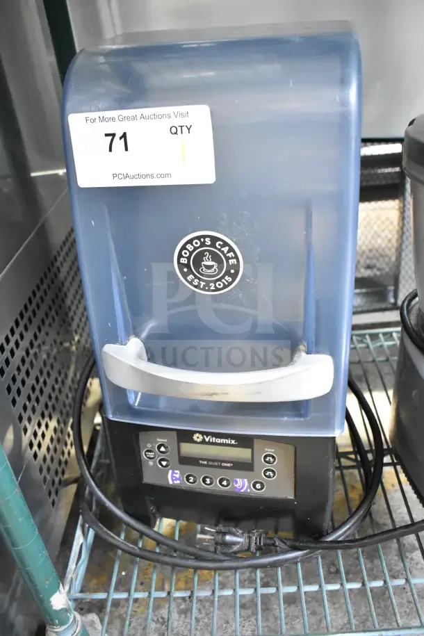 Vita-Mix The Quiet One blender with sound enclosure, commercial-grade, in used condition, auction label visible.