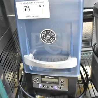 Vita-Mix The Quiet One blender with sound enclosure, commercial-grade, in used condition, auction label visible.