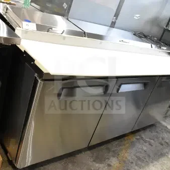 BRAND NEW Migali Commercial Pizza Prep Table, stainless steel, with minor scratches and dents, 115 Volts, 1 Phase.