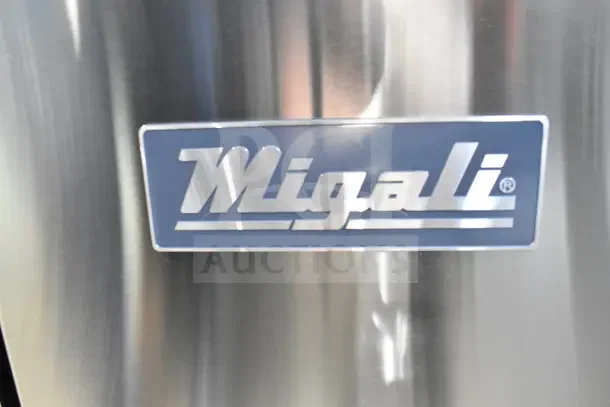 Migali Commercial Pizza Prep Table logo, stainless steel finish. 115 volts, 1 phase. Brand new with minor scratches and dents.