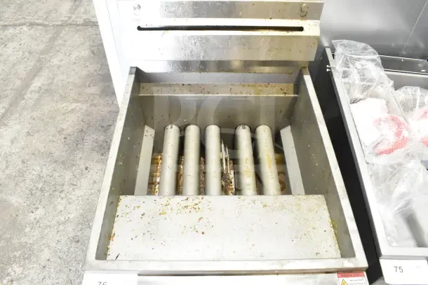 2025 Migali C-F75-NG commercial gas fryer, 75 lb capacity, 170,000 BTU, visible sediment inside, serial C-F75-NGUSB1CPBW003.