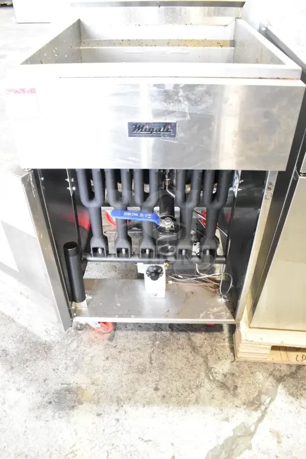 Migali C-F75-NG commercial gas fryer, 75-lb capacity, 170,000 BTU, serial C-F75-NGUSB1CPBW003, partial inside view, condition visible.