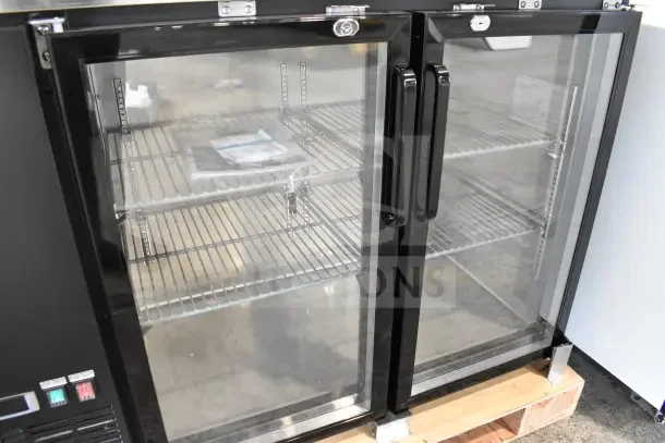 Brand new Migali C-BB48G-HC 2-door cooler. Scratch and dent model, glass doors, shelves, 115V, serial 929808215.