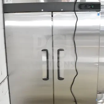 Brand new Migali C-2F-HC commercial 2-door reach-in freezer, 115V, 1 phase, with minor scratches and dents. Serial C-2F-HCPABC009.