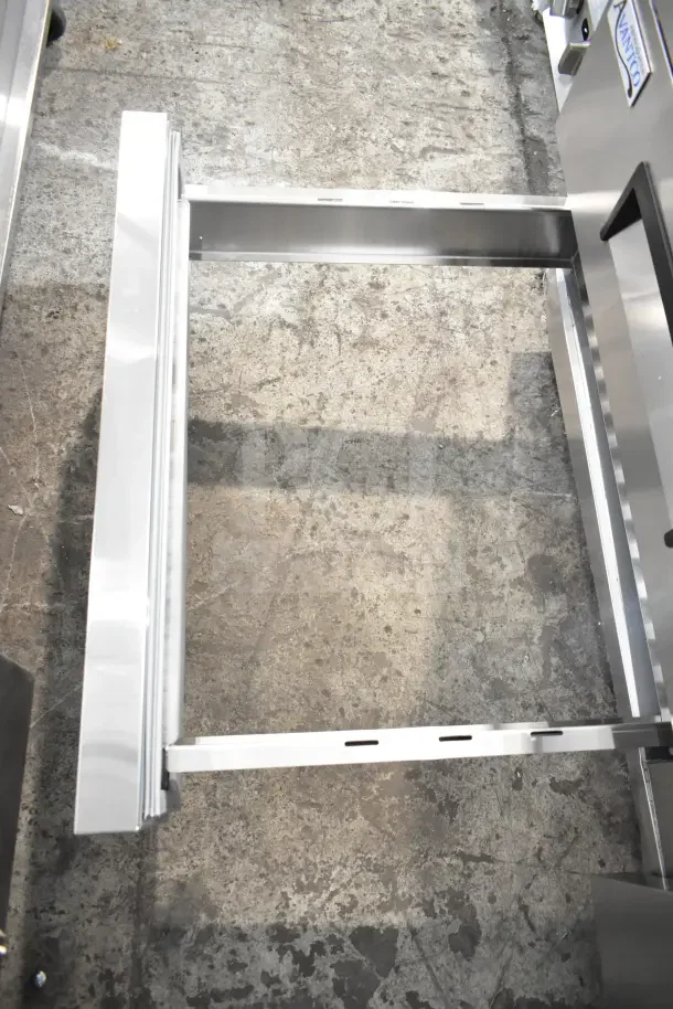 Brand new Avantco 178CBE72HC commercial chef base with 4 drawers shown with drawer open. 115 Volts, 1 Phase.