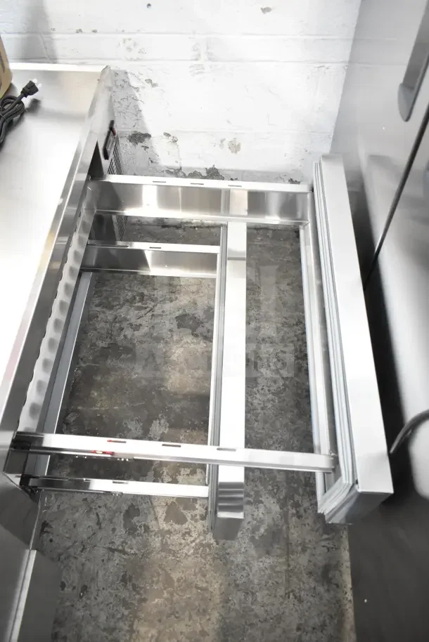 Brand new Avantco 178CBE72HC commercial 4-drawer chef base, 115 volts, 1 phase, stainless steel, slight scratches.