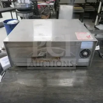 One Wisco Stainless Steel Countertop Pizza Oven. Model# 412-3NCT. 120 Volt. 18X15X8. $410.00